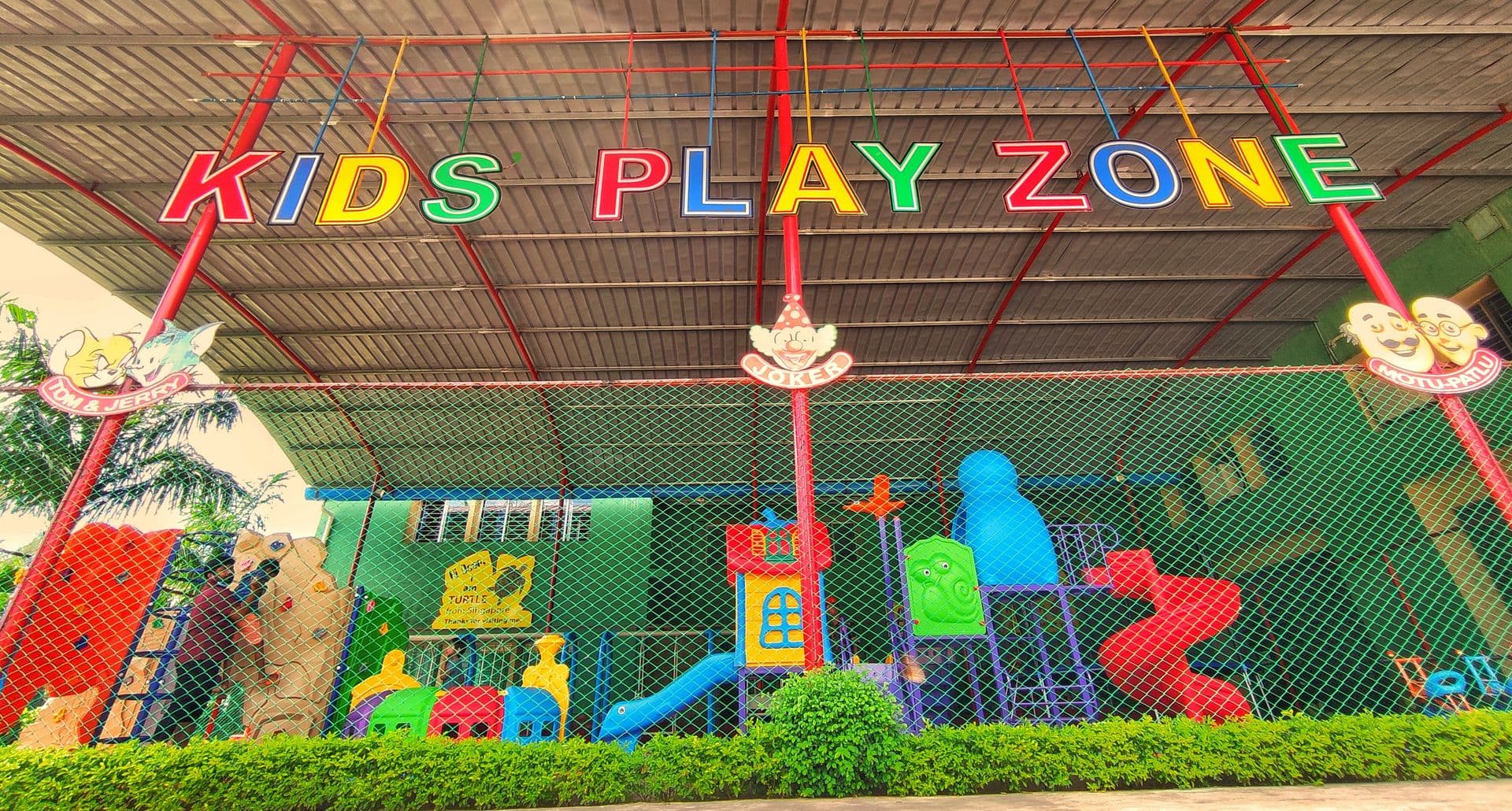 Students actively participating in a music class, playing various instruments